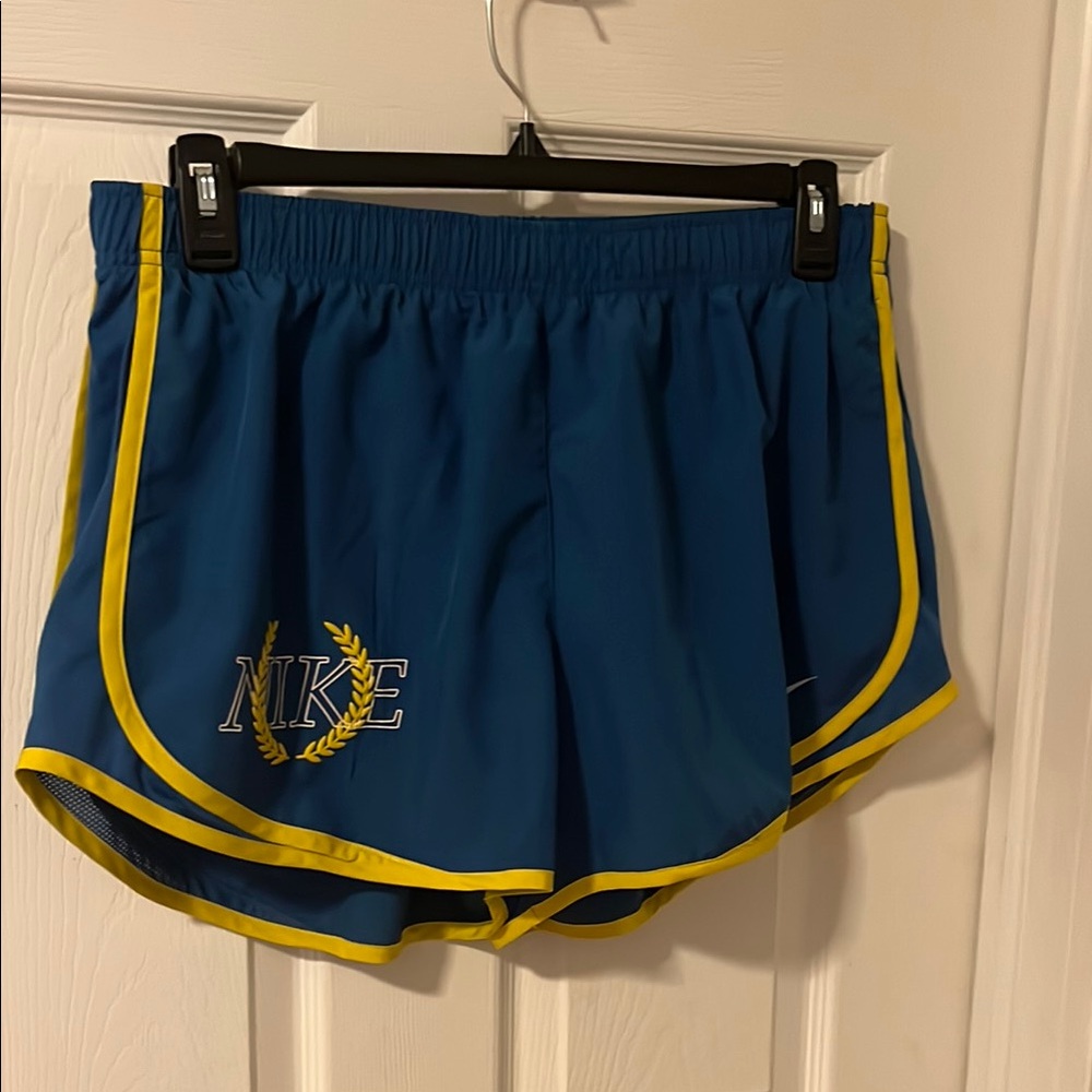 Nike Women's Blue Shorts with Yellow Trim. Size XL.